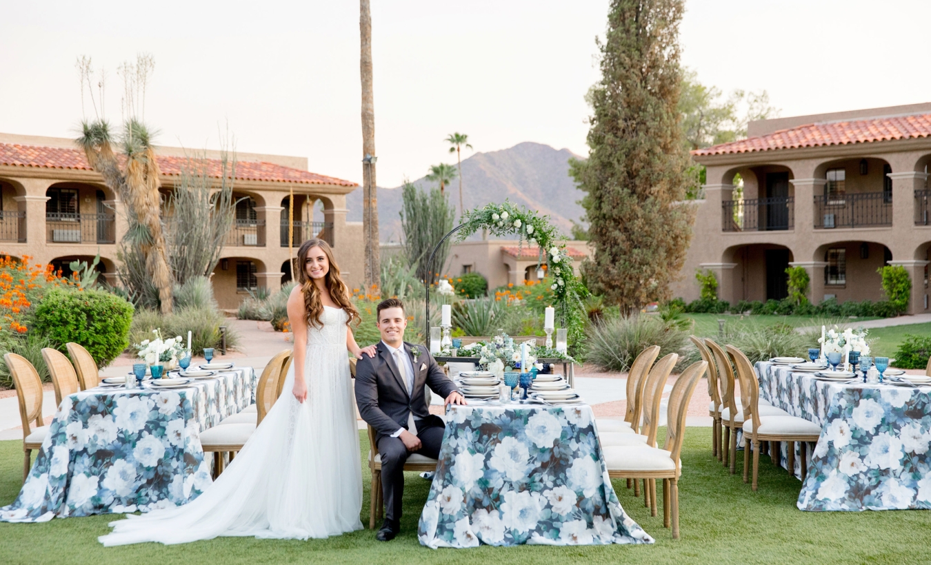 A bride and groom at an outdoor wedding reception in Arizona