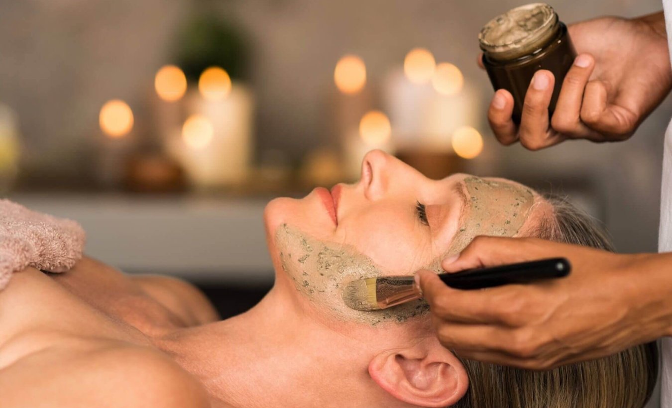 image of a woman receiving a face treatment